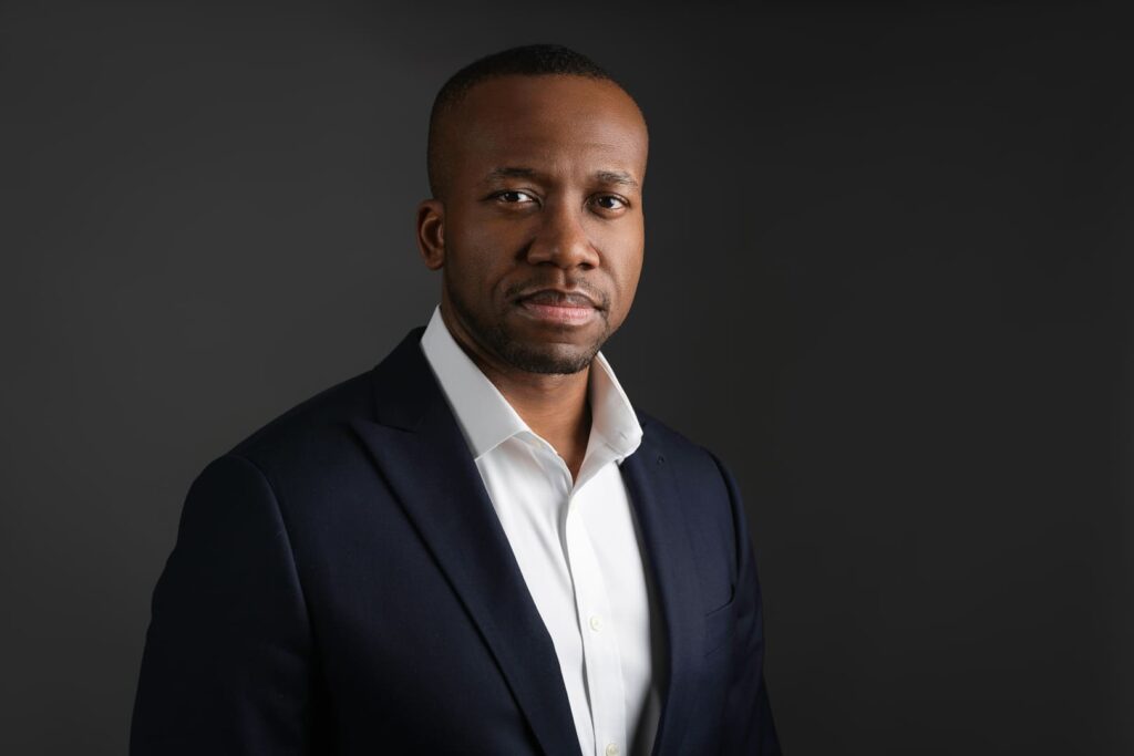 Man posing for a headshot.