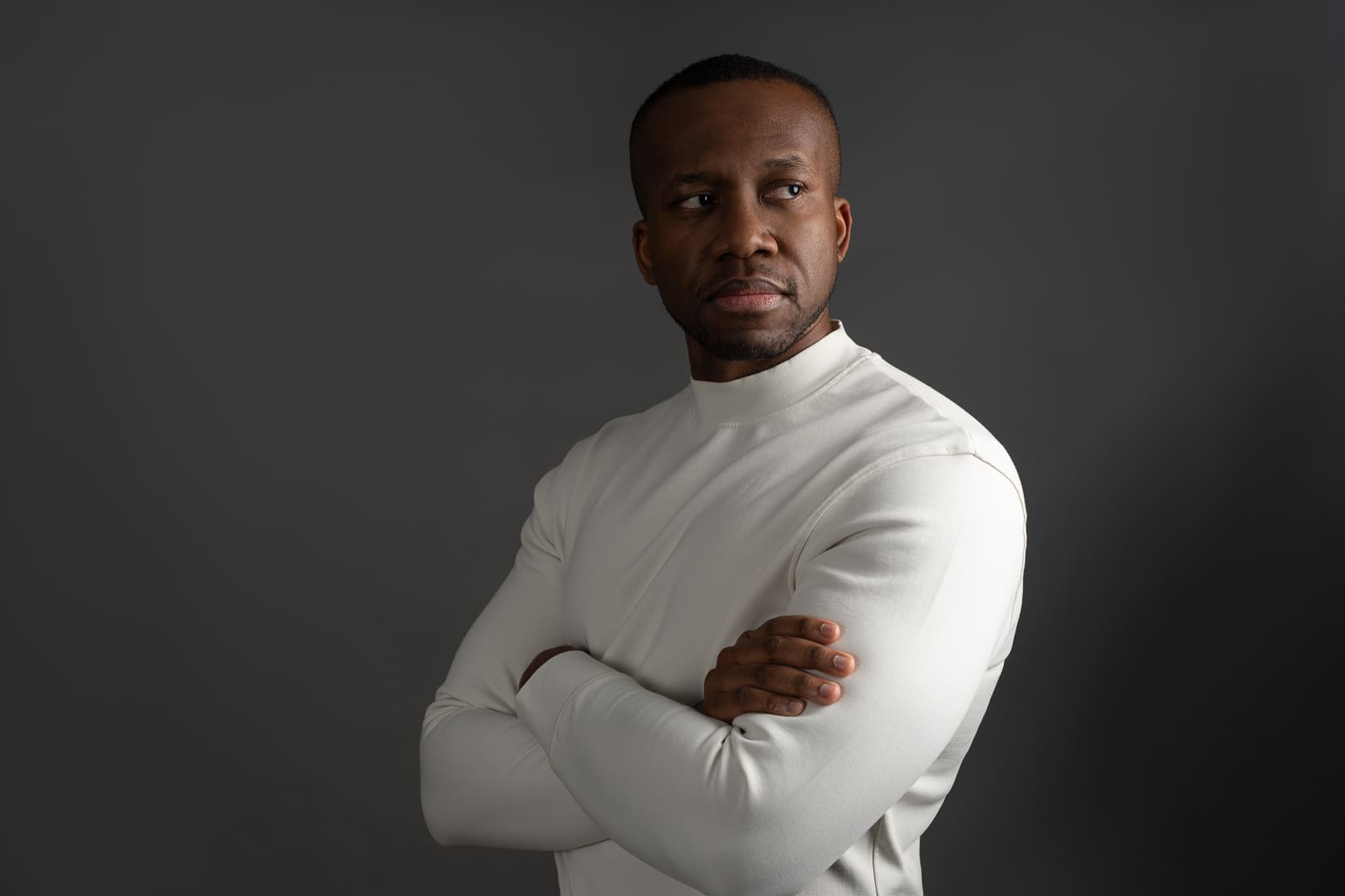 Man posing for headshot.