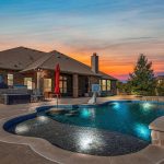 Pool behind home at twilight.