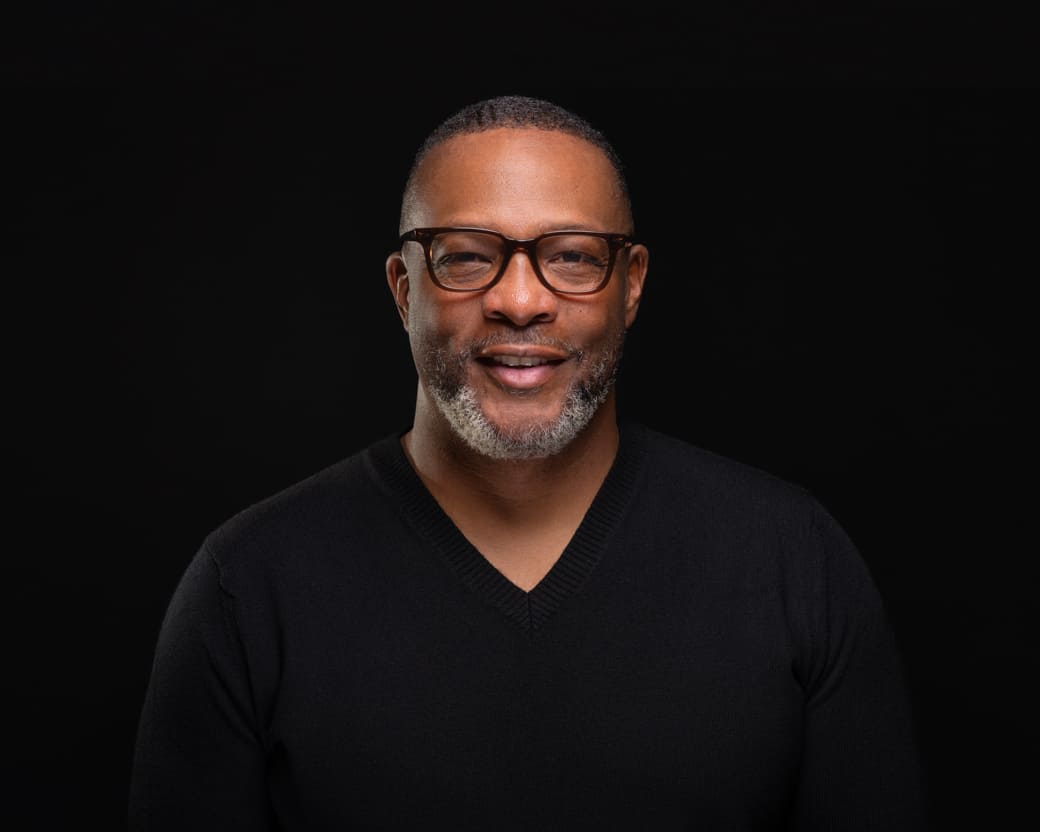 Man posing for headshot.