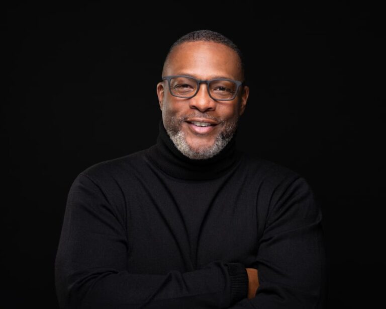 Man posing for headshot.