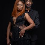 Couple posing for portrait in studio.