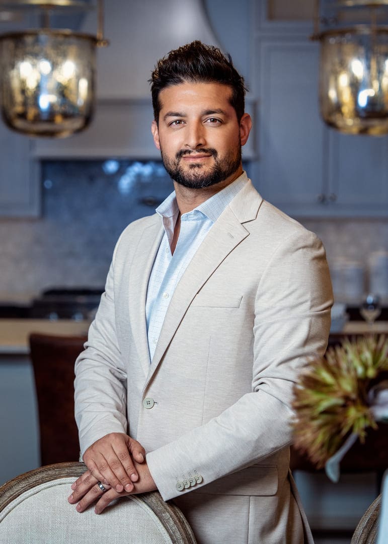 Man posing for headshot.