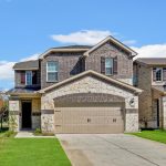 Home exterior on sunny day.