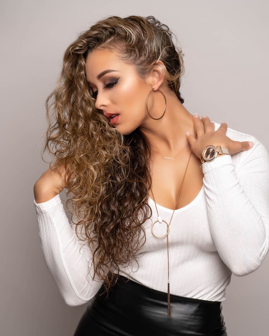 Girl models in studio.