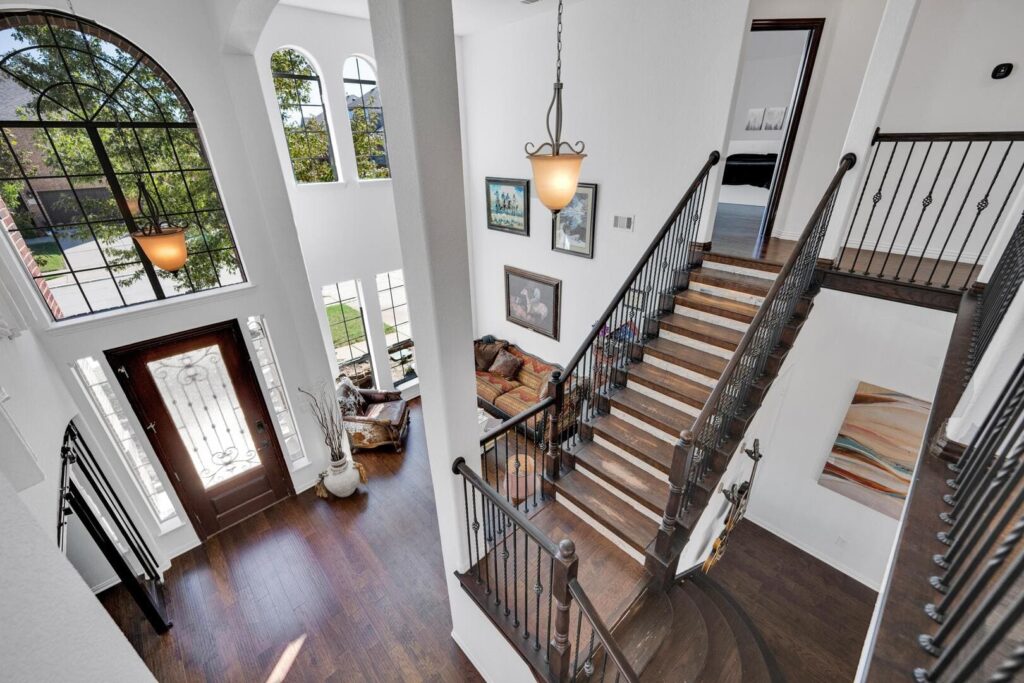 Home interior overlooking banister.
