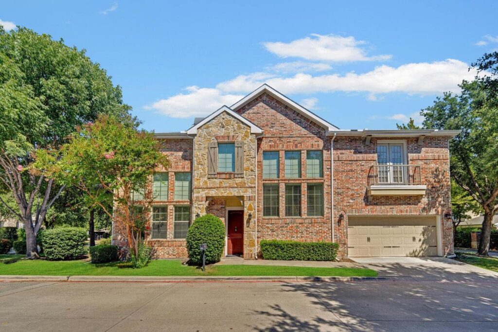 Home exterior on a sunny day.