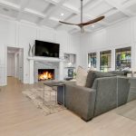 Nice living room with a fire in fireplace.