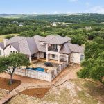 Aerial drone photo of a Texas Hillcountry home.