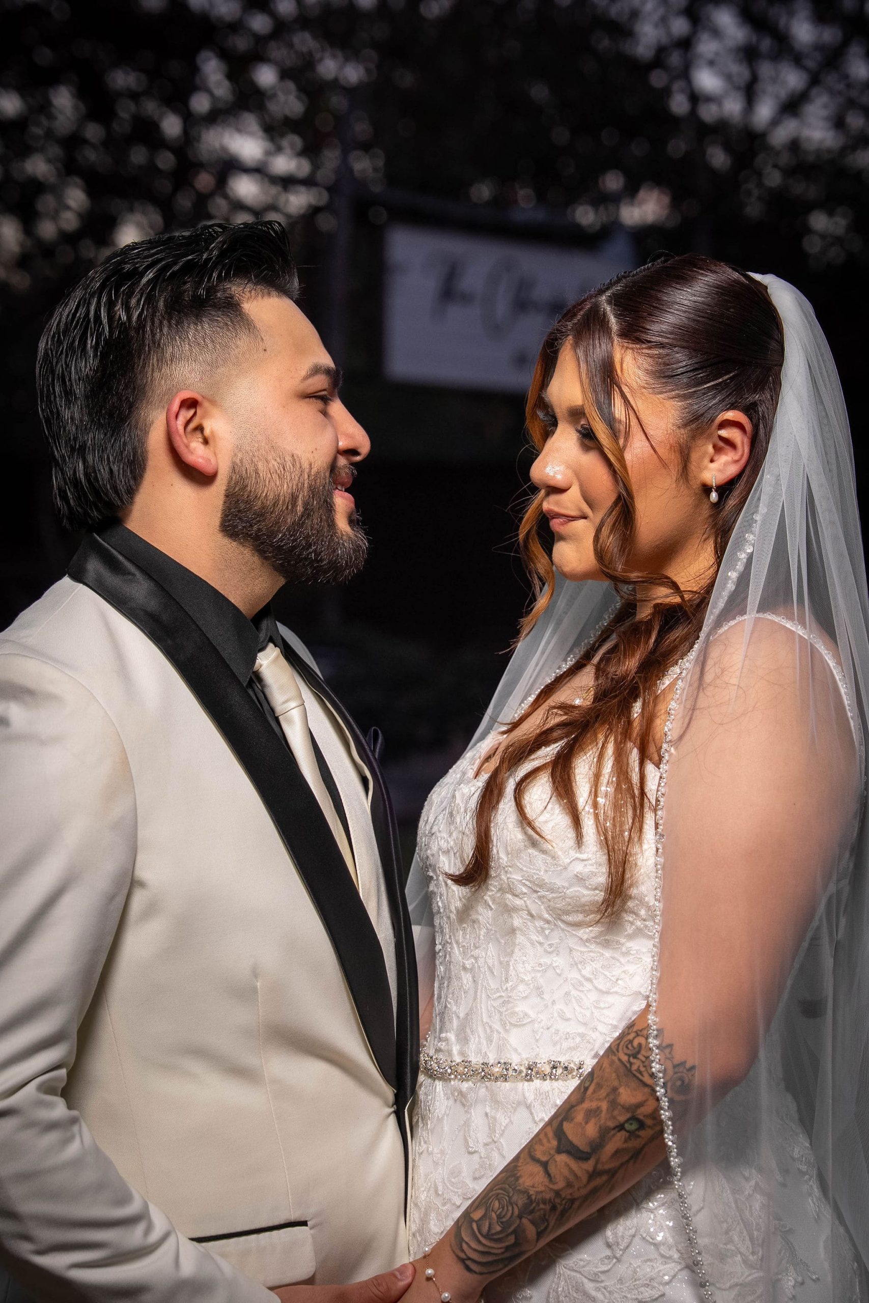 Wedding couple posing for portrait.