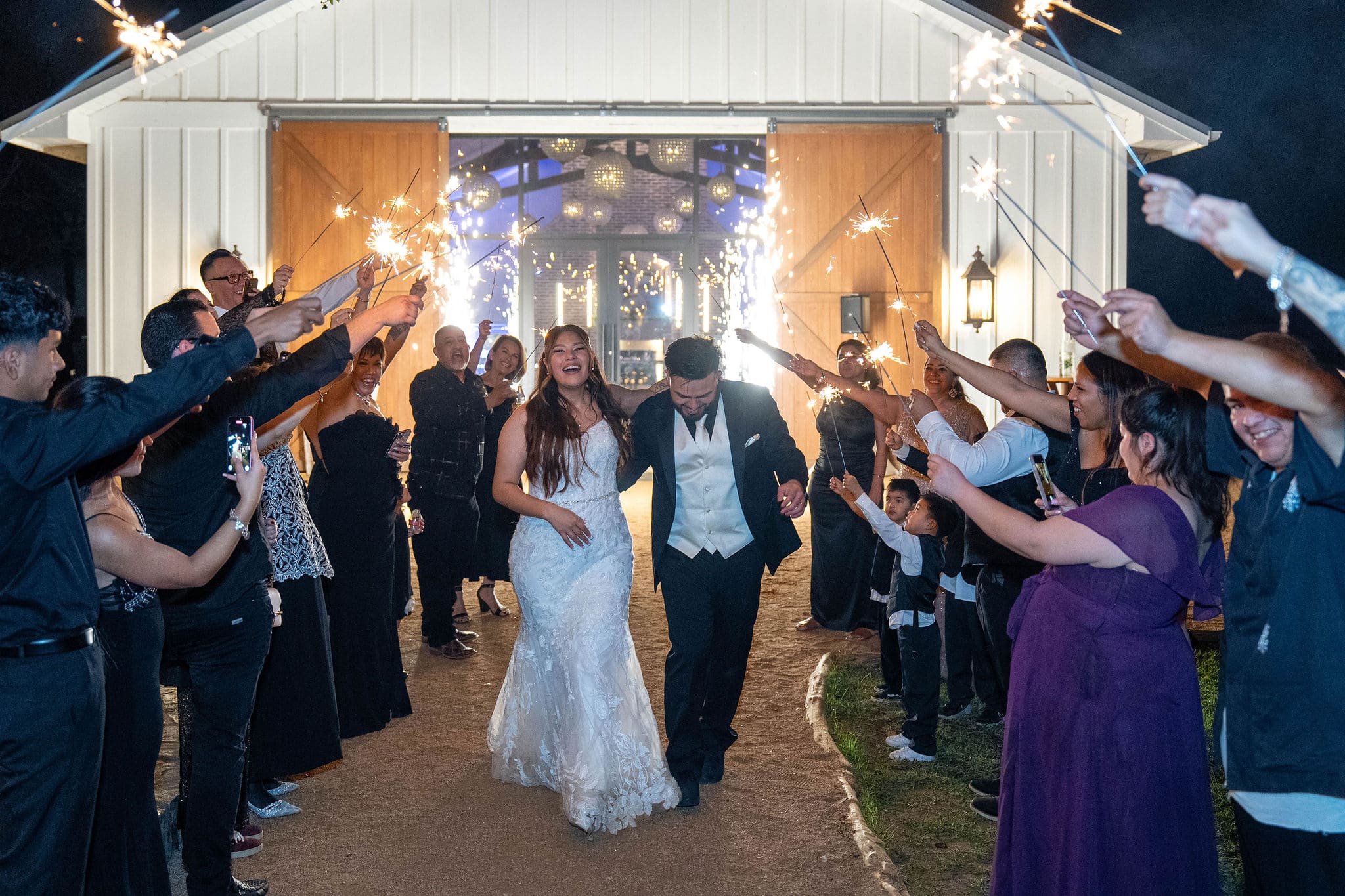 Wedding couple leaving reception