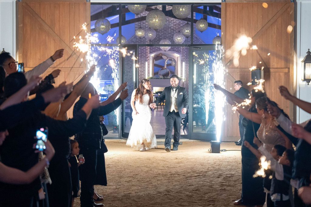 Wedding couple leaving reception