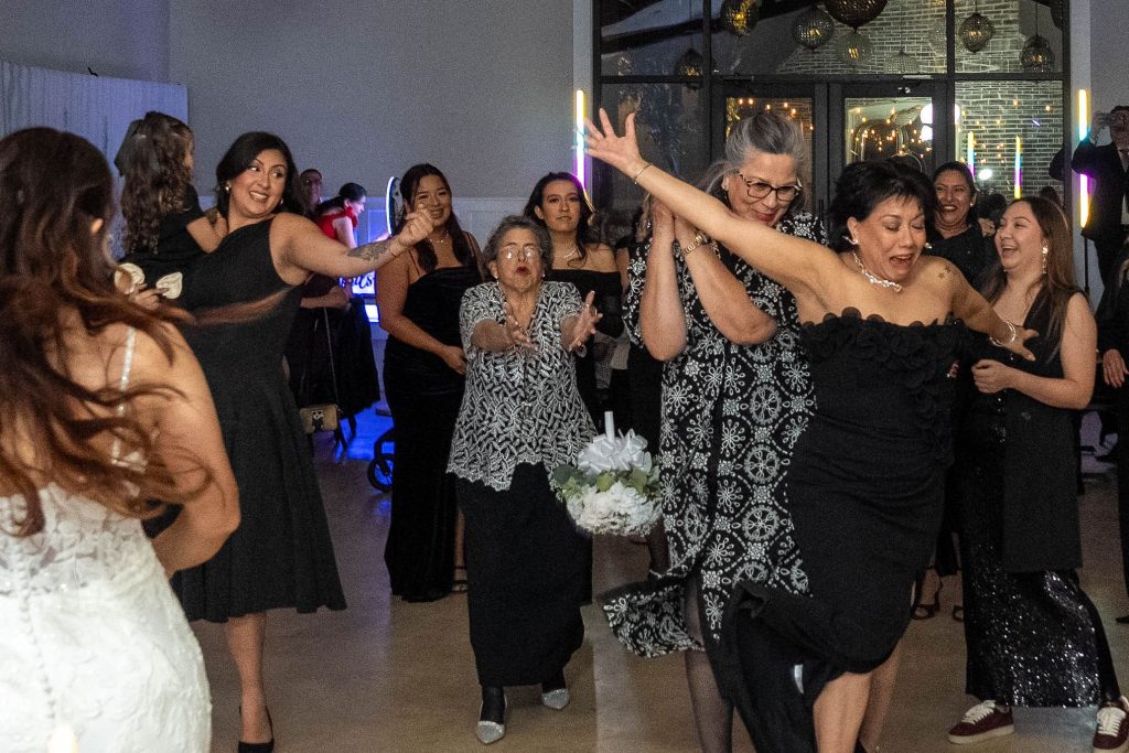 Woman dropping wedding bouquet