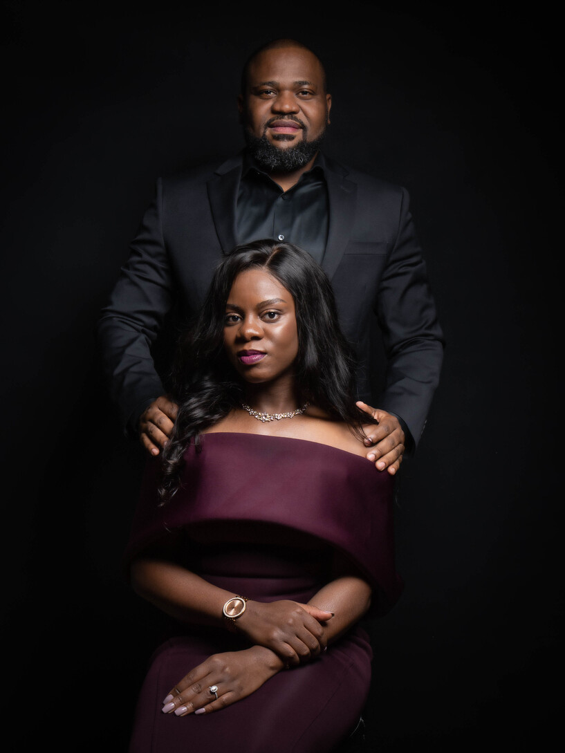 Couple posing for portrait photographer